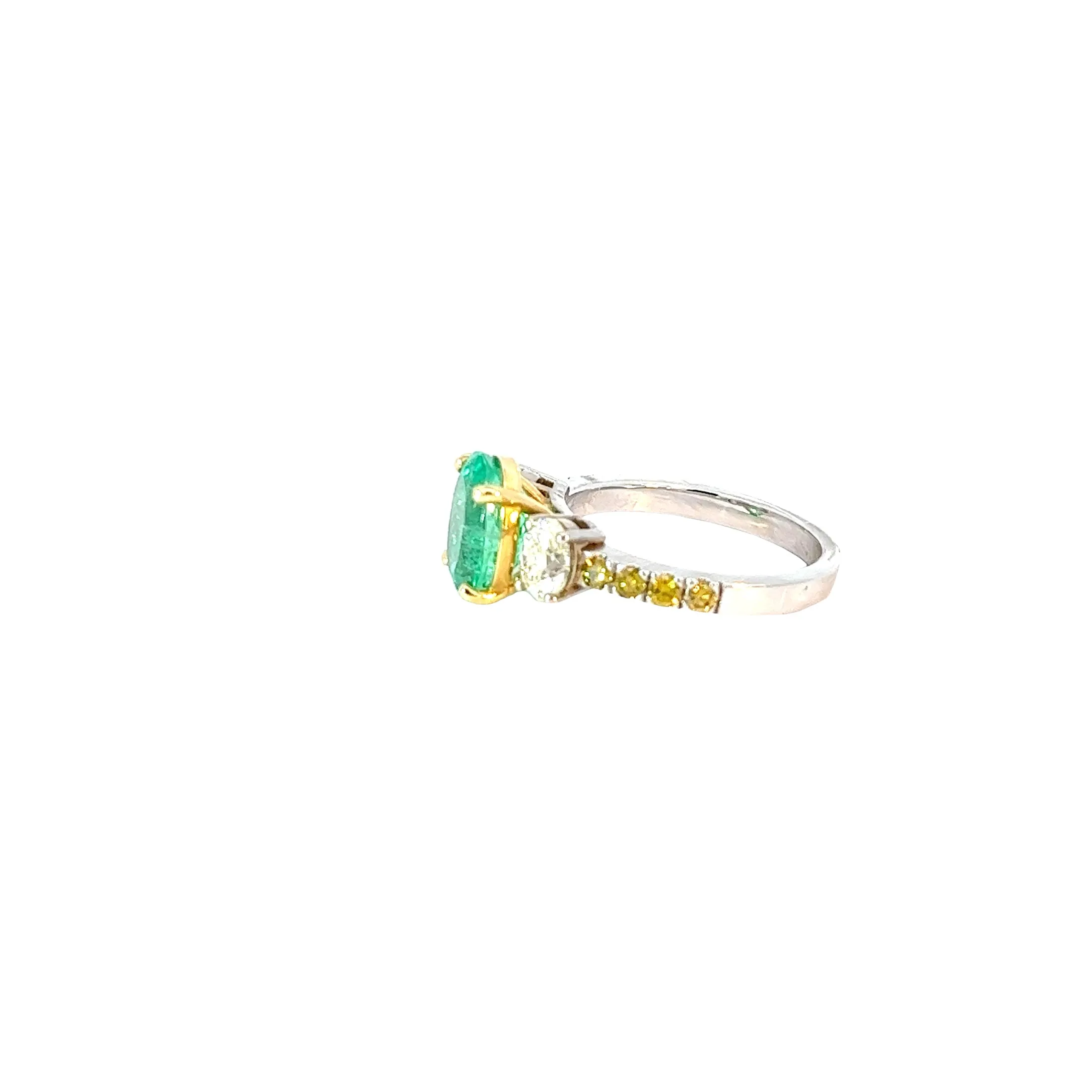 18k White Gold 2.45ct Oval Columbian Emerald and .80ct G VS2 Oval Diamond and .30ct yellow Diamond Ring