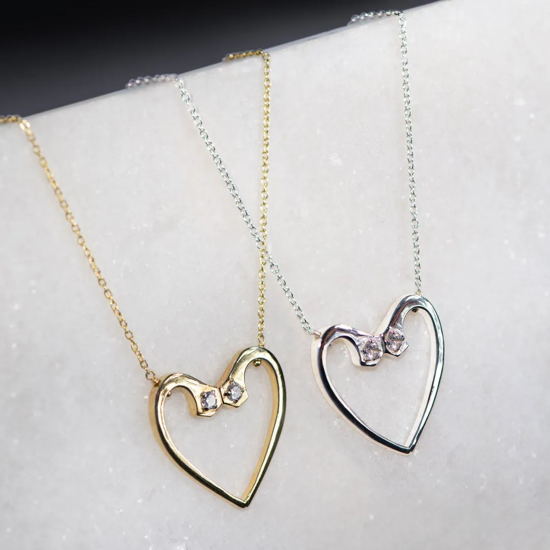 Charmed - Stylized Horseshoe Nail and Moissanite Stone Sterling Silver Heart Pendant Necklace