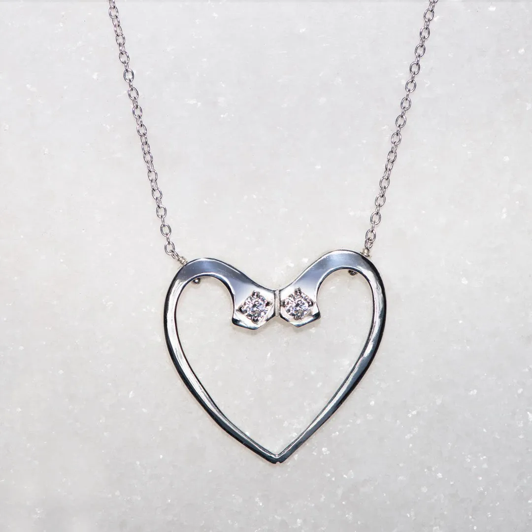 Charmed - Stylized Horseshoe Nail and Moissanite Stone Sterling Silver Heart Pendant Necklace
