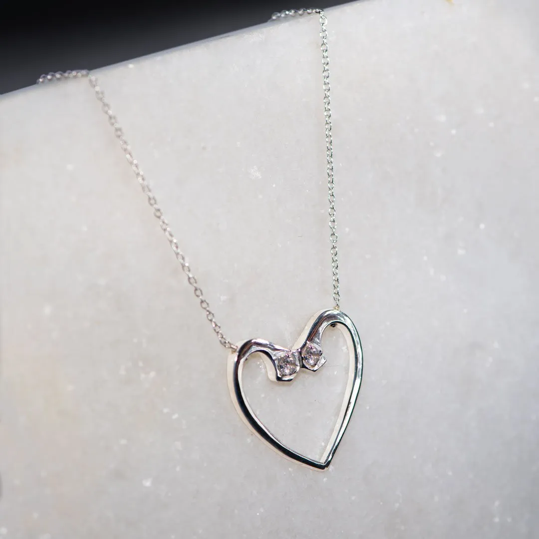 Charmed - Stylized Horseshoe Nail and Moissanite Stone Sterling Silver Heart Pendant Necklace