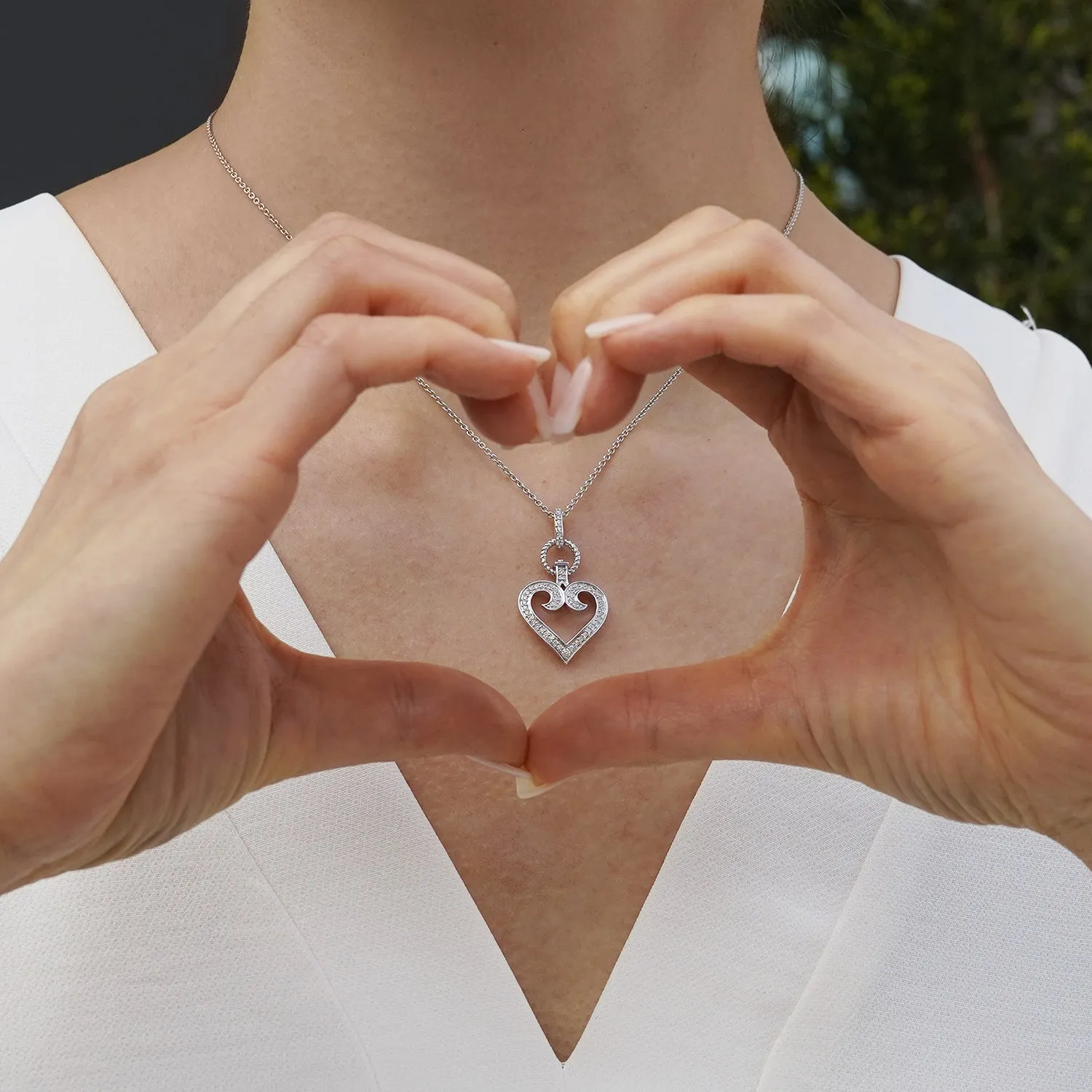Hallmark Fine Jewelry Large Diamond Follow Your Heart Pendant in Sterling Silver
