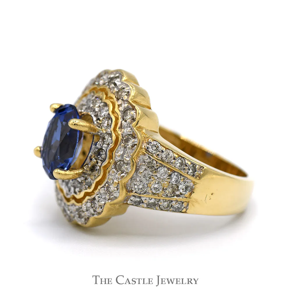 Oval Tanzanite Ring with 3/4cttw Diamond Accented Sides and Halo in 14k Yellow Gold